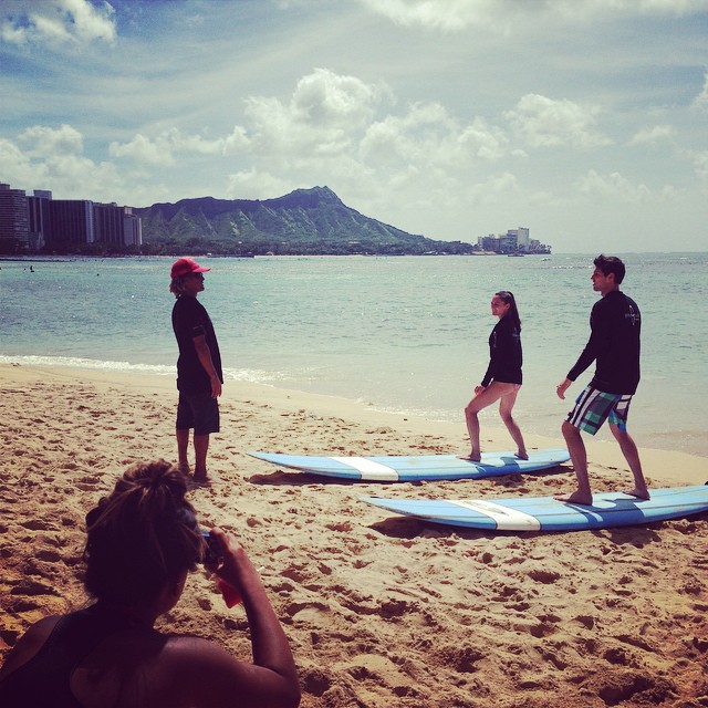 photo - a waikiki surfing lesson taking place in the morning with gone surfing hawaii team - the best Best Surfing in Hawaii for Beginners