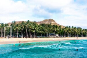 photo - diamond head hawaii with waves and greenery 