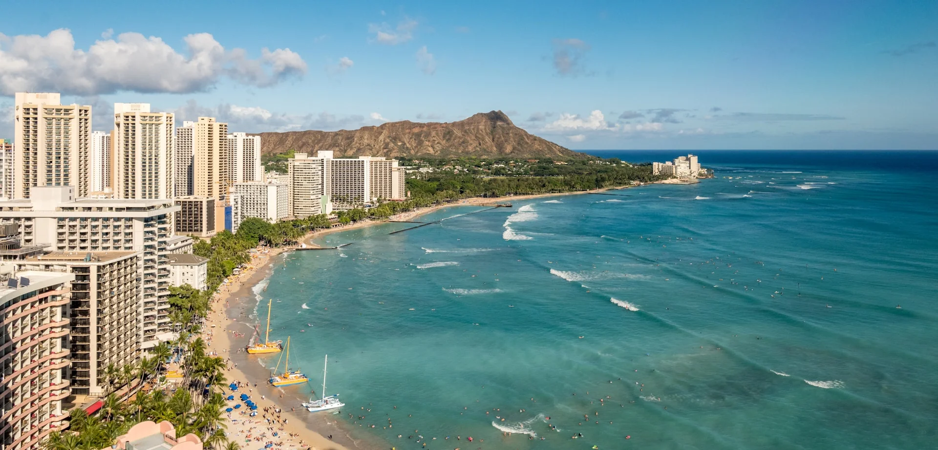 photo - beautiful view of people surfing in waikiki