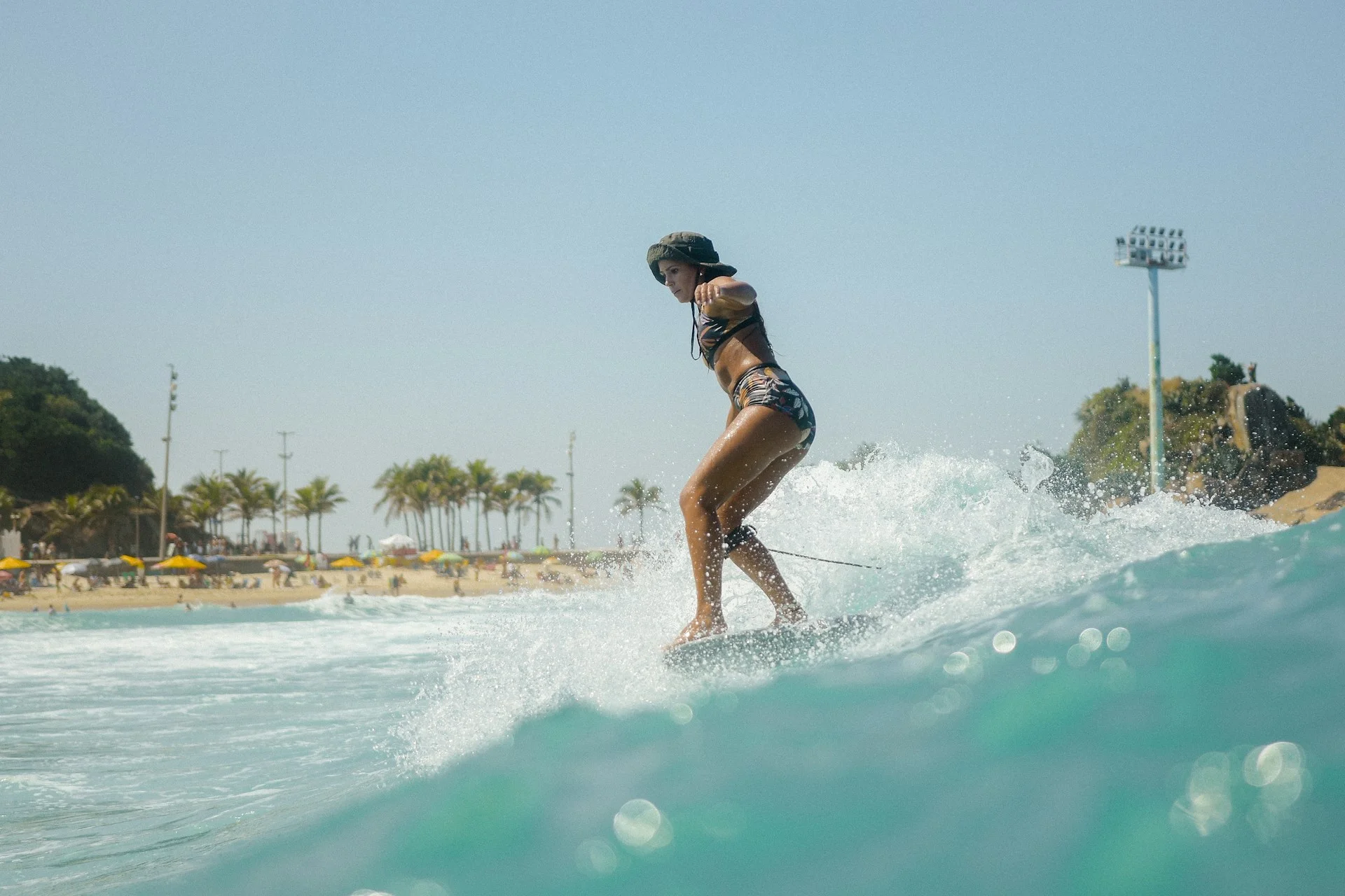 photo - a woman on a waikiki surf board balancing and doing surfing as therapy