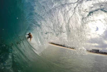 photo - a man in the wave surfing a surf break