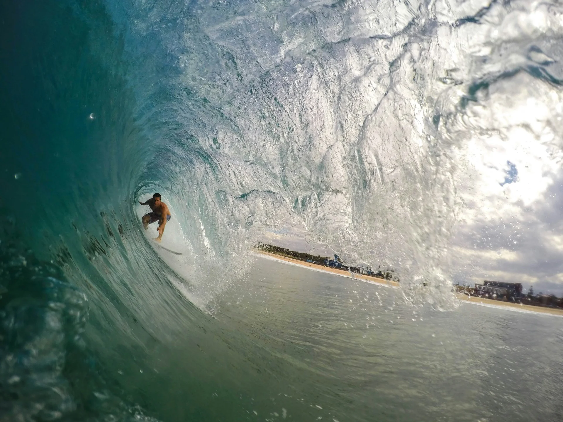 photo - a man in the wave surfing a surf break