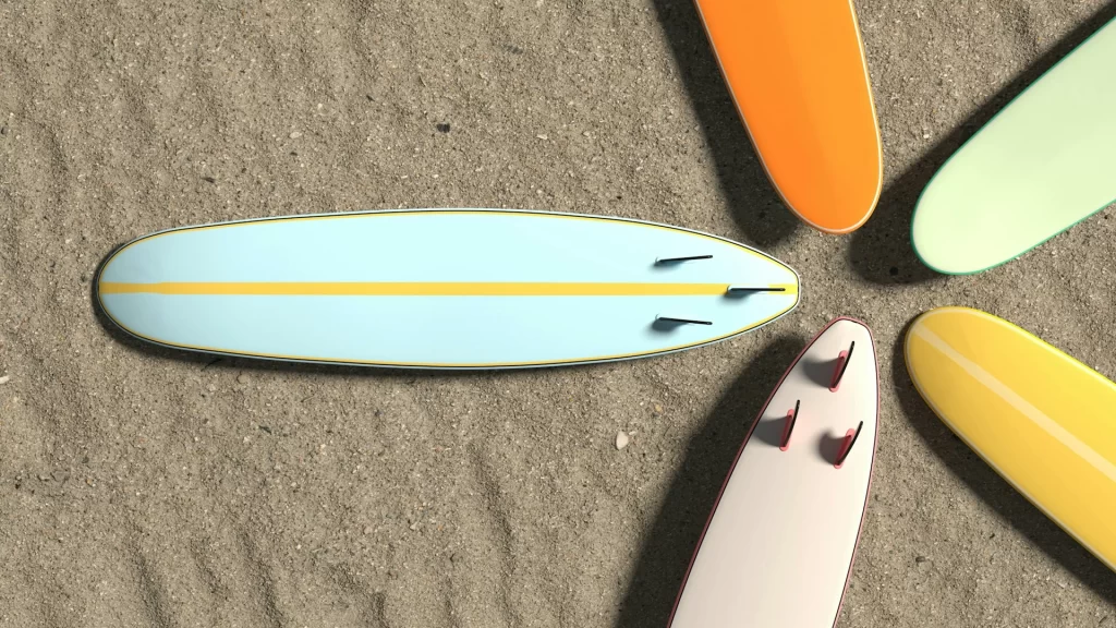 photo - surf boards on sand