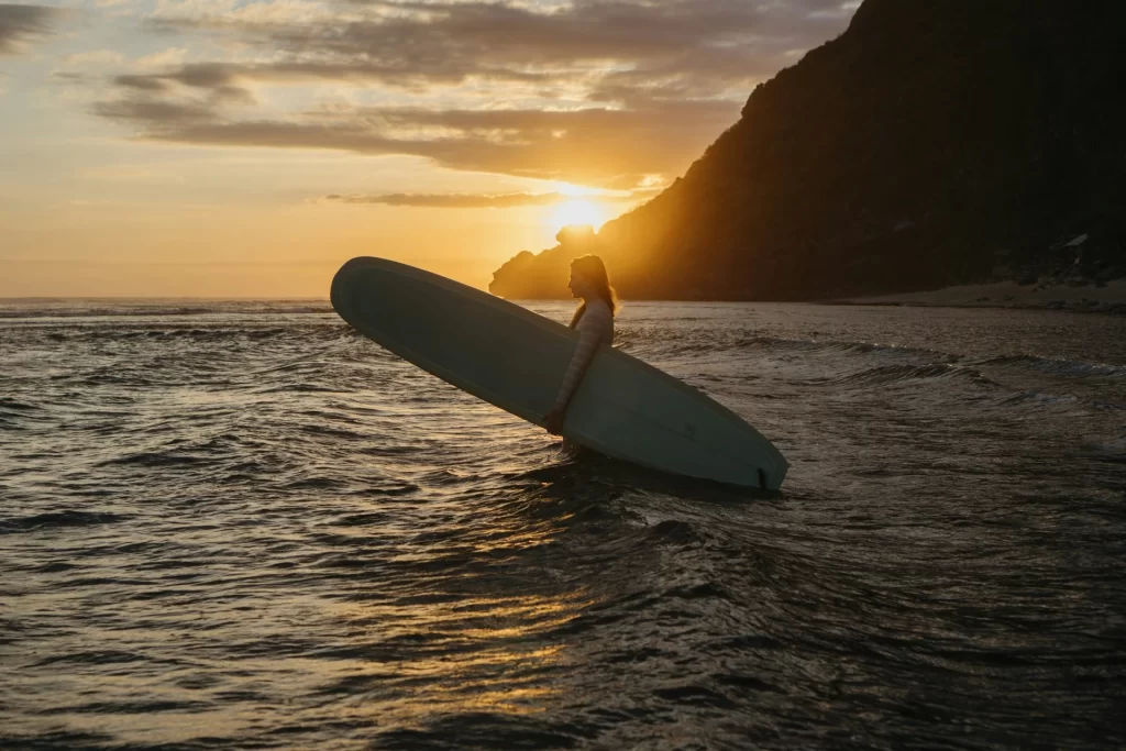 photo - a girl is about to learn how to surf